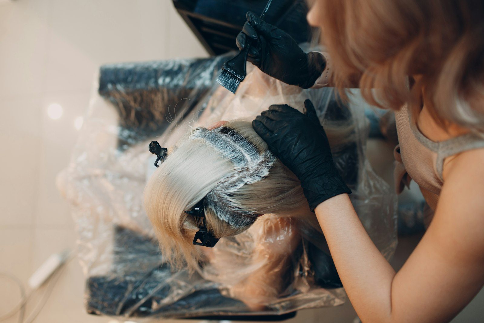 Hair colour being applied in a salon