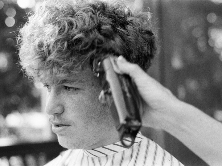 Man using clippers at home