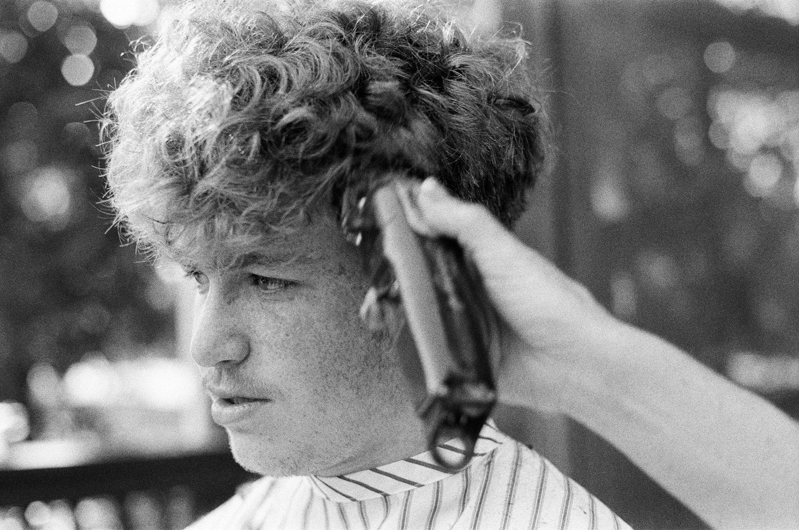 Man using clippers at home
