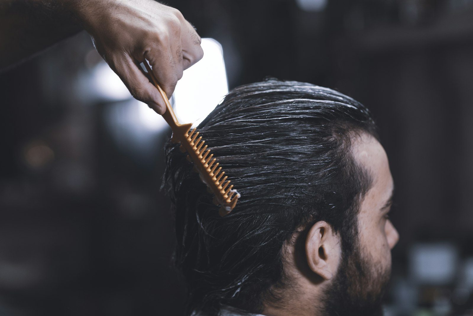 Man with fine hair styled for volume